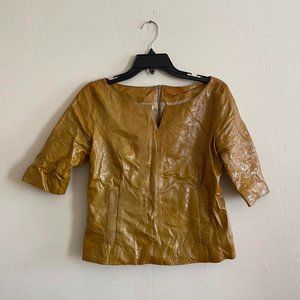 Carolina Herrera patent leather top